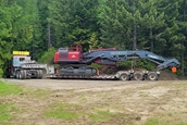 New Komatsu by forest